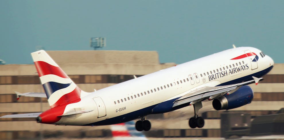 A British Airways aircraft takes off, showcasing aviation and travel themes.