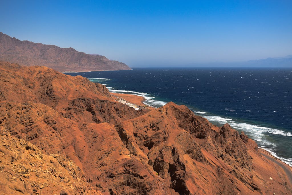 Breathtaking view of the rugged cliffs along the Red Sea coast in Dahab, South Sinai, Egypt.