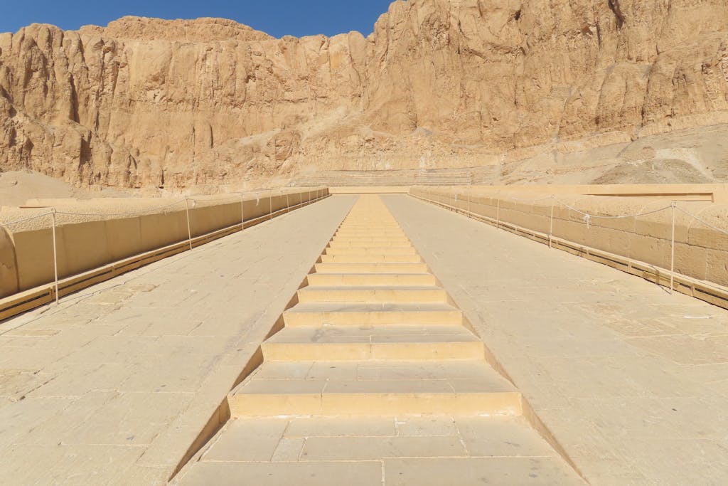 Stone steps at Hatshepsut Temple in Luxor, revealing ancient Egyptian architecture.